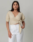 Beige Wrap Crop Top by THE MRCH MUSE