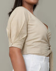Beige Wrap Crop Top by THE MRCH MUSE