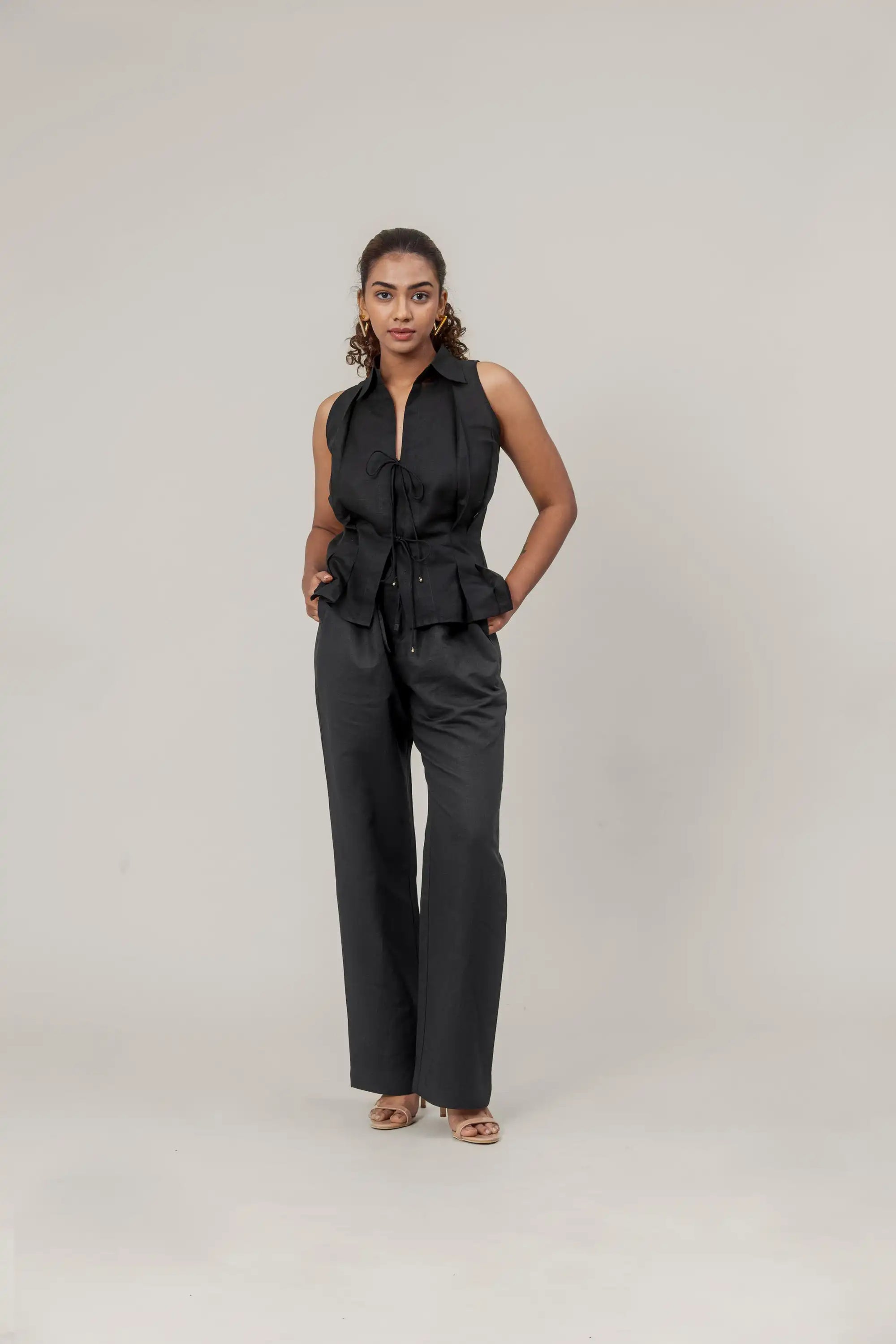 Black Sleeveless Shirt by THE MRCH MUSE