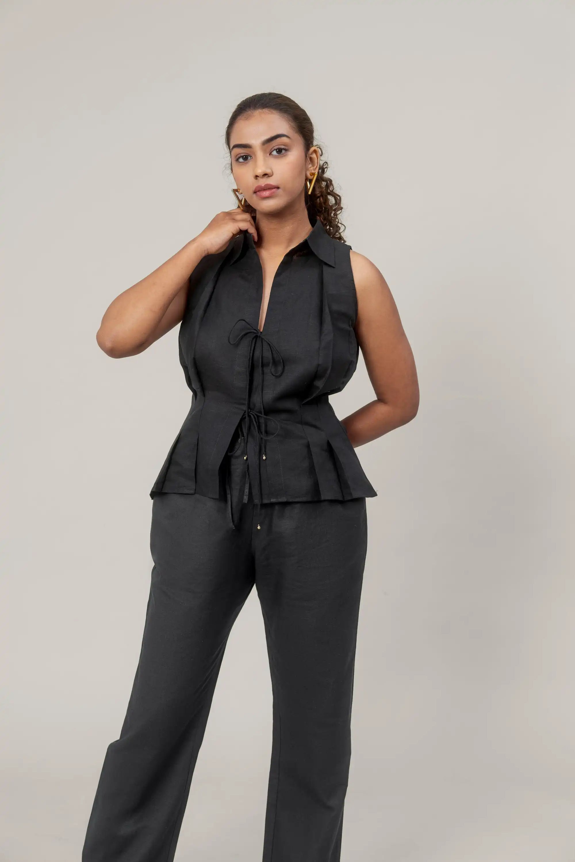 Black Sleeveless Shirt by THE MRCH MUSE