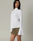White Flared Cuff Shirt by THE MRCH MUSE